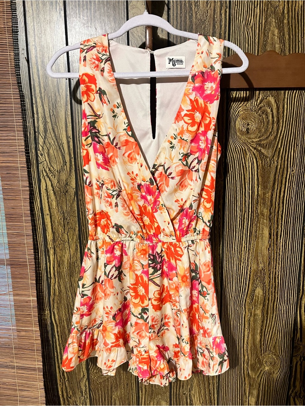 Sleeveless Floral V-Neck Mini Romper in Peach Floral